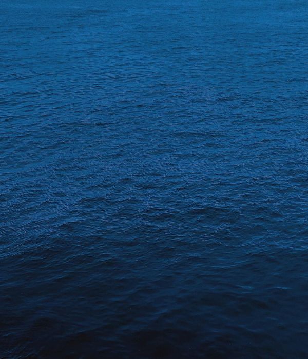 Abstract deep blue atmosphere representing calm breathing focus